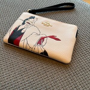 Coach Cruella Cream and Black Wristlet